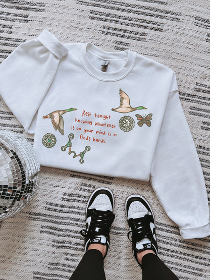 In God’s Hands Tee or Crewneck
