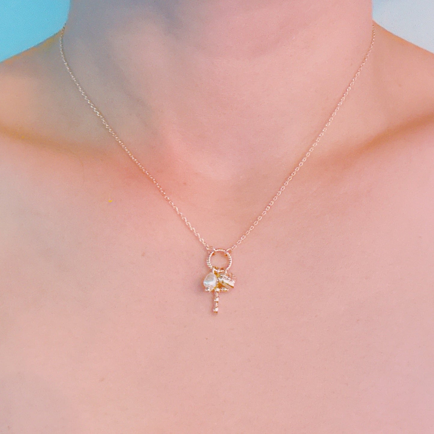 Faith & Love Charm Necklace – Gold-Tone Chain with Heart, Cross, and Pearl Charms